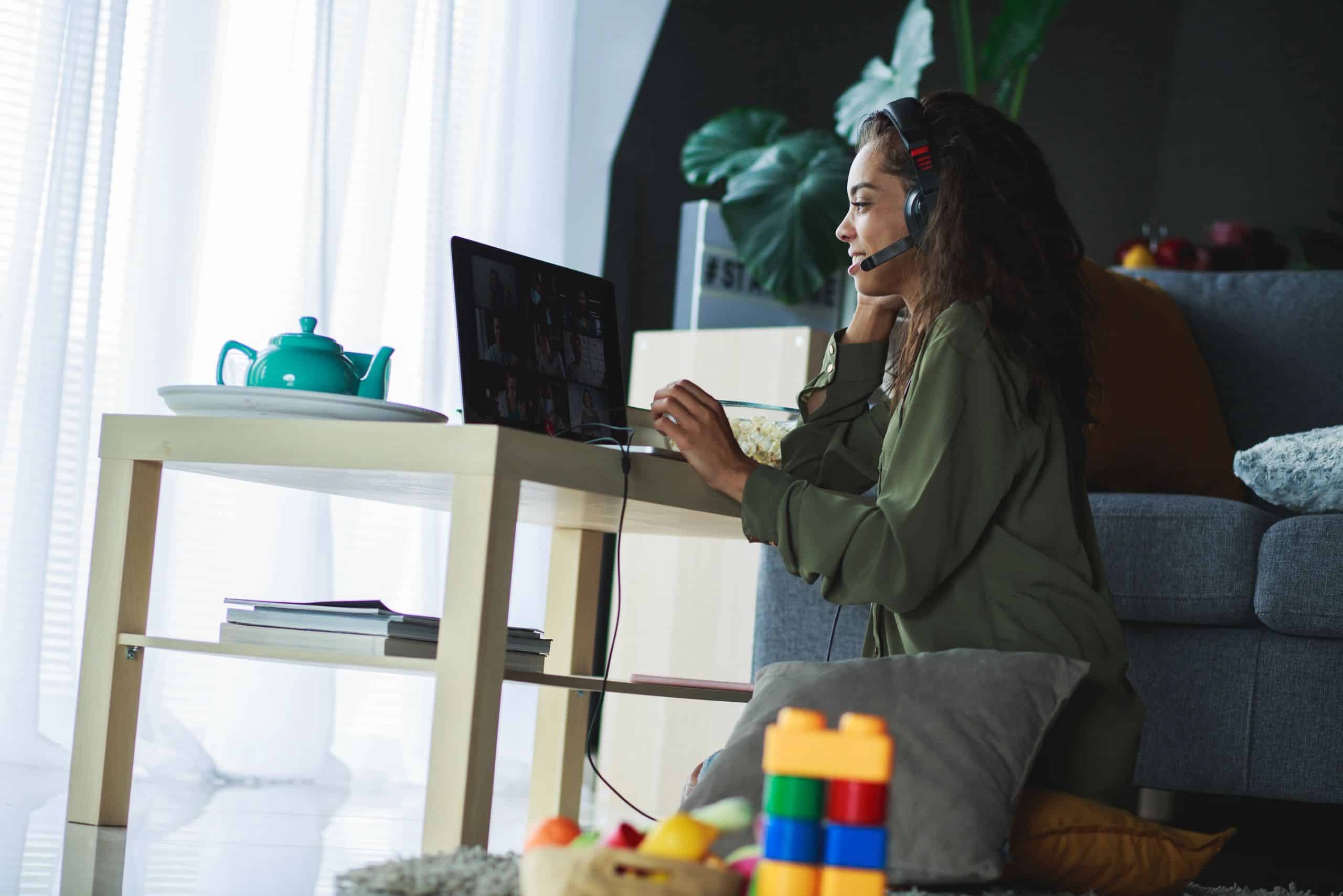 Woman using a computer for online support conversation