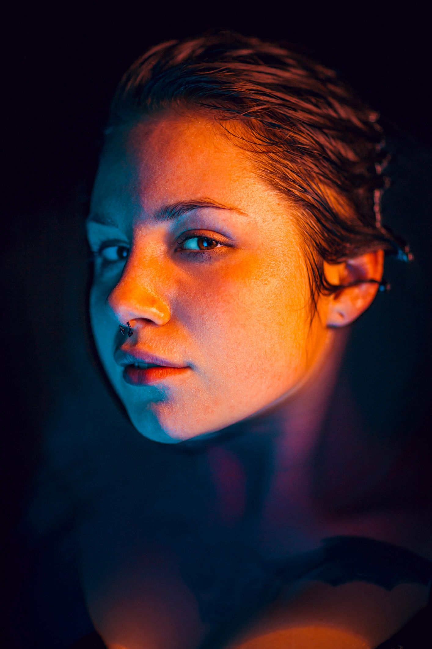 Moody artistic portrait in dark water